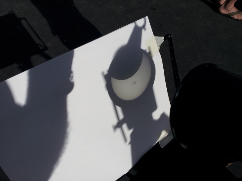 Eyepiece projection of partial solar eclipse. Sky & Telescope