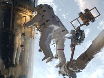 Astronauts repair Hubble Space Telescope