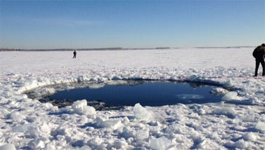 Ice hole in Lake Chebarkul