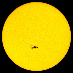 Sun with spot on central meridian