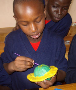 Kenyan boy and Saturn