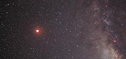 Eclipsed Moon and the Milky Way